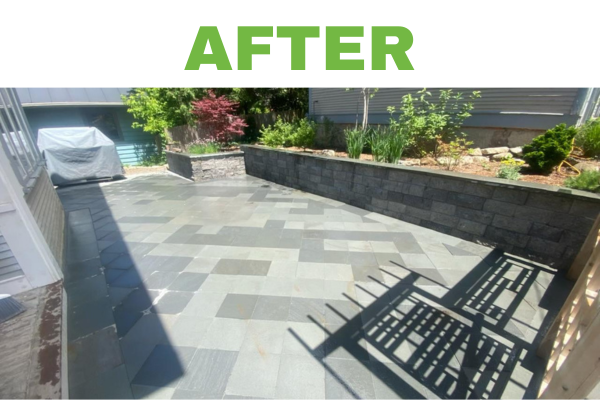 After landscape renovation: A custom stone patio in Burlington, Vermont, featuring professional tile work, clean stone veneer retaining walls, and integrated garden design. This durable outdoor space includes expert drainage and elegant walkways.
